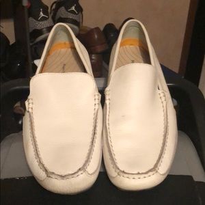 White loafer slip on shoes